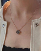 Van Cleef & Arpels Vintage Alhambra holiday pendant 2023