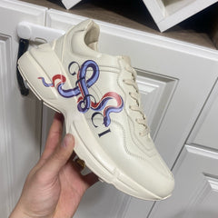 Guci Rhyton sneaker with Snake print